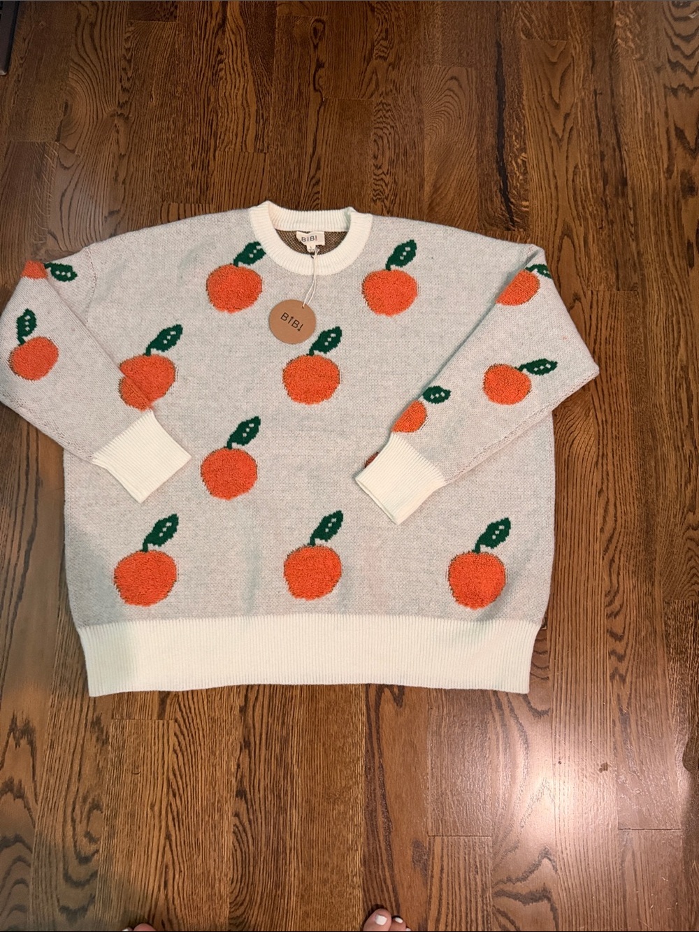 BiBi Cream Crewneck Sweater with Orange Fruit Motif large